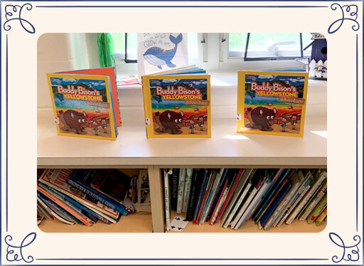 Buddy Bison books on bookshelf