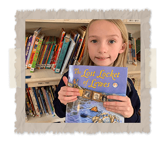 little girl holding the lost locket of lewes book