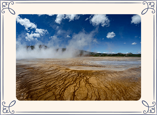 Photo of steam coming from the earth at Yellowstone National Park